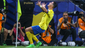 Al Nassr's Portuguese striker Cristiano Ronaldo celebrates a goal scored with his team against Al-Ittihad in the Saudi championship, at the King Saud University Stadium in Riyah, on May 27, 2024 Fayez NURELDINE